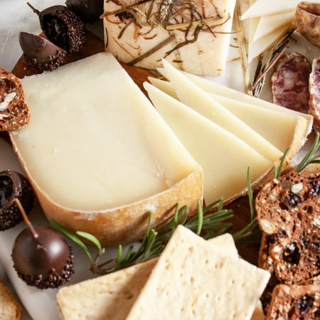 Istara Ossau-Iraty French Cheese - Whole Wheel (9 pound) - Istara has a smooth, slightly oily texture and a wonderfully sweet flavor with hints of olive, hazelnut and fig. Aged for 90 days