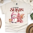 thumbnail image 1 of It’s Freezing Season T-Shirt | Cute Snowman and Pink Tree Holiday Tee, Natural, Size S, 1 of 6