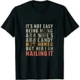 thumbnail image 1 of It's Not Easy Being My Wife's Arm Candy Retro Funny Husband T-Shirt, 1 of 3