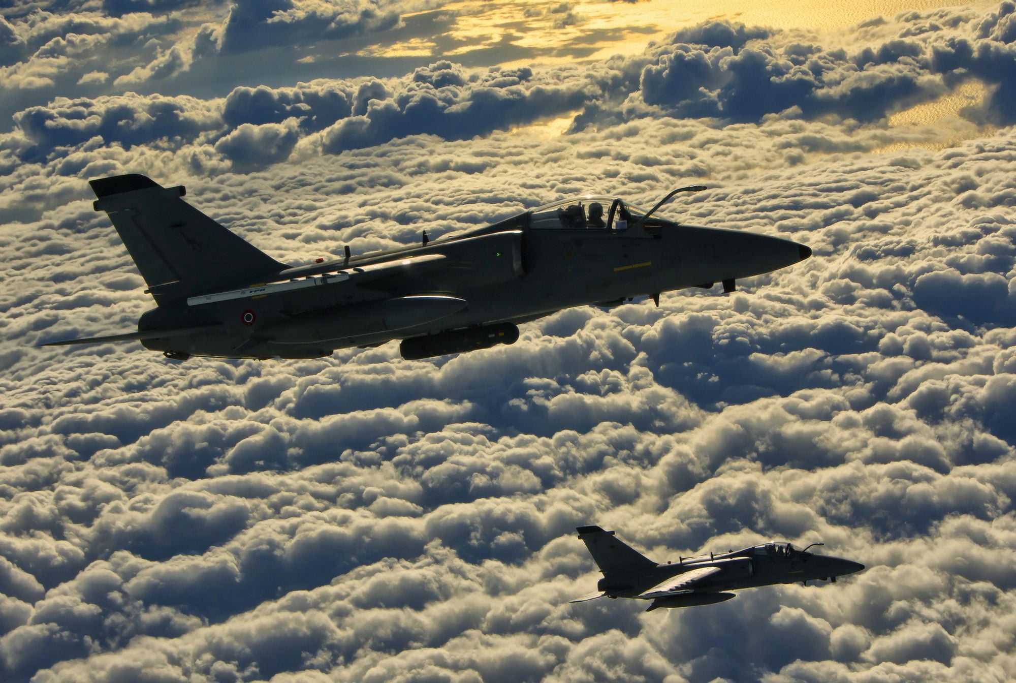 Italian Air Force AMX-ACOL aircraft flying above the clouds Canvas Art - Giovanni CollaStocktrek Images (34 x 23)