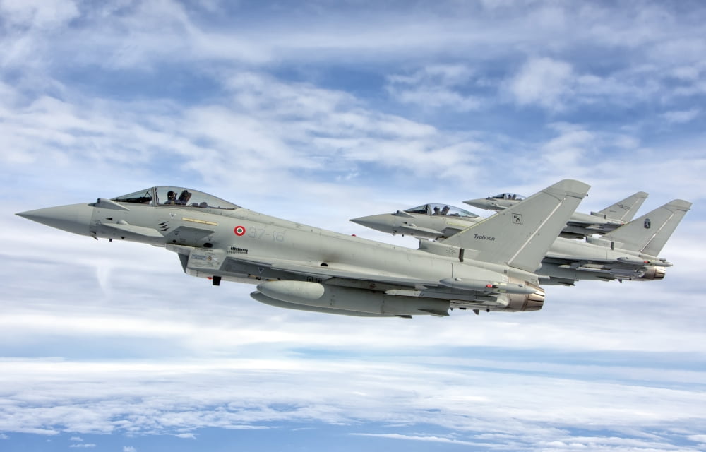 Italian Air Force F-2000 Typhoon aircraft fly in formation Canvas Art - Giovanni CollaStocktrek Images (35 x 23)
