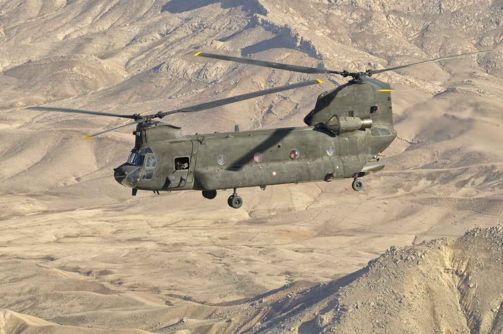 Italian Army CH-47C Chinook helicopter in flight over Afghanistan Canvas Art - Giovanni CollaStocktrek Images (35 x 24)