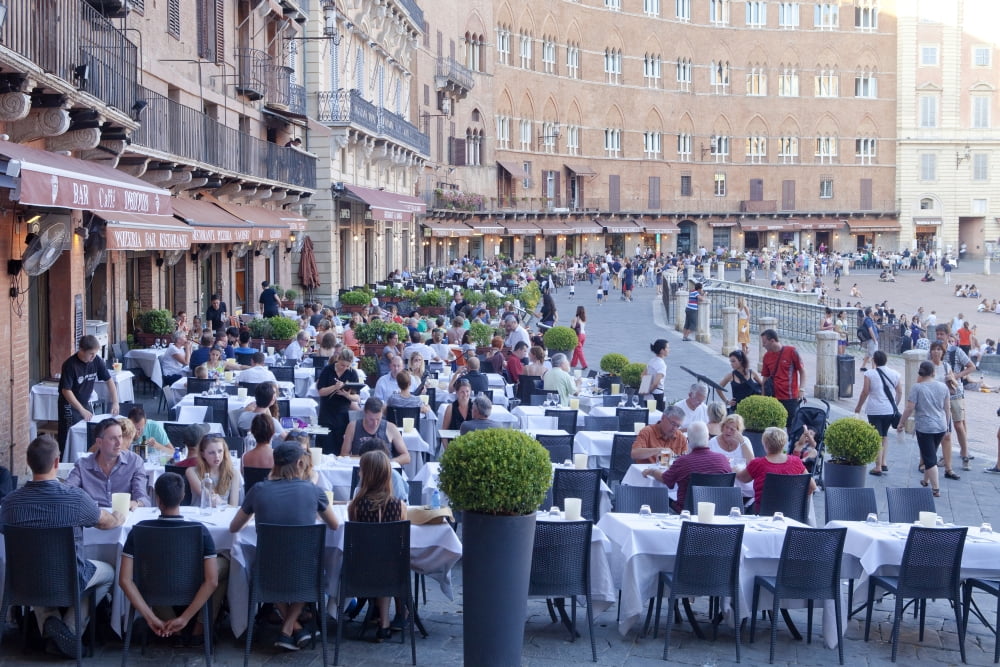 Italy Tuscany Piazza del Campo - tourists at restaurants Canvas Art - Panoramic Images (27 x 9)
