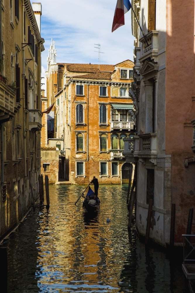 Italy Venice Rowing gondola through canal Canvas Art - Richard Desmarais Design Pics (12 x 19)