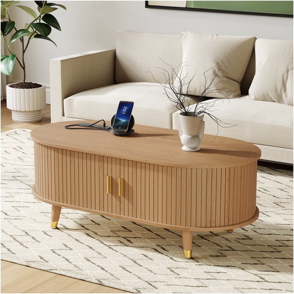 JERFIT 42.5 Inch Modern Oval Coffee Table with Charging Station, Fluted Sliding Door, Mid-Century Farmhouse Cocktail Table for Living Room, Natural