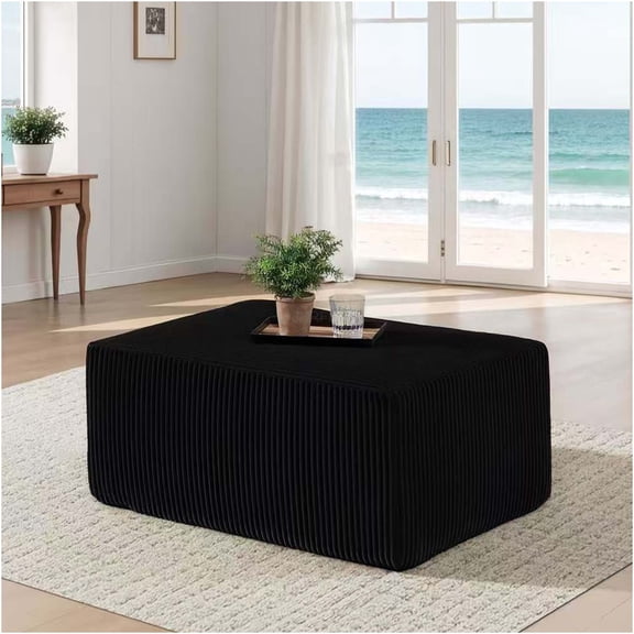 JERFIT Compressed Ottoman Pouf, Black Corduroy, No Assembly Footstool, Accent Stool for Living Room, Dense Foam, Expands Instantly