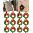 thumbnail image 1 of JEWLALO 12PCS Mini Christmas Wreaths for Cabinets, 6" Tiny Holiday Wreaths with Pinecones, Red Berries & Bows, Festive Xmas Mini Garland Decor for Cabinets, Chairs, Windows & Gifts, 1 of 7