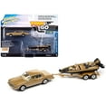 thumbnail image 1 of 1980 Chevrolet Monte Carlo Light Camel Gold Metallic with Bass Boat and Trailer Limited Edition to 7264 pieces Worldwide "Tow & Go" Series 1/64 Diecast Model Car by Johnny Lightning, 1 of 3