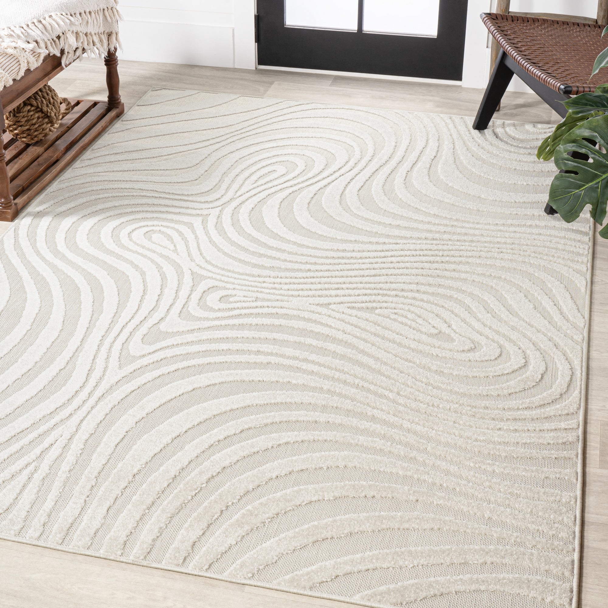 Cream and Ivory 8' x 10' High-Low Striped Synthetic Area Rug