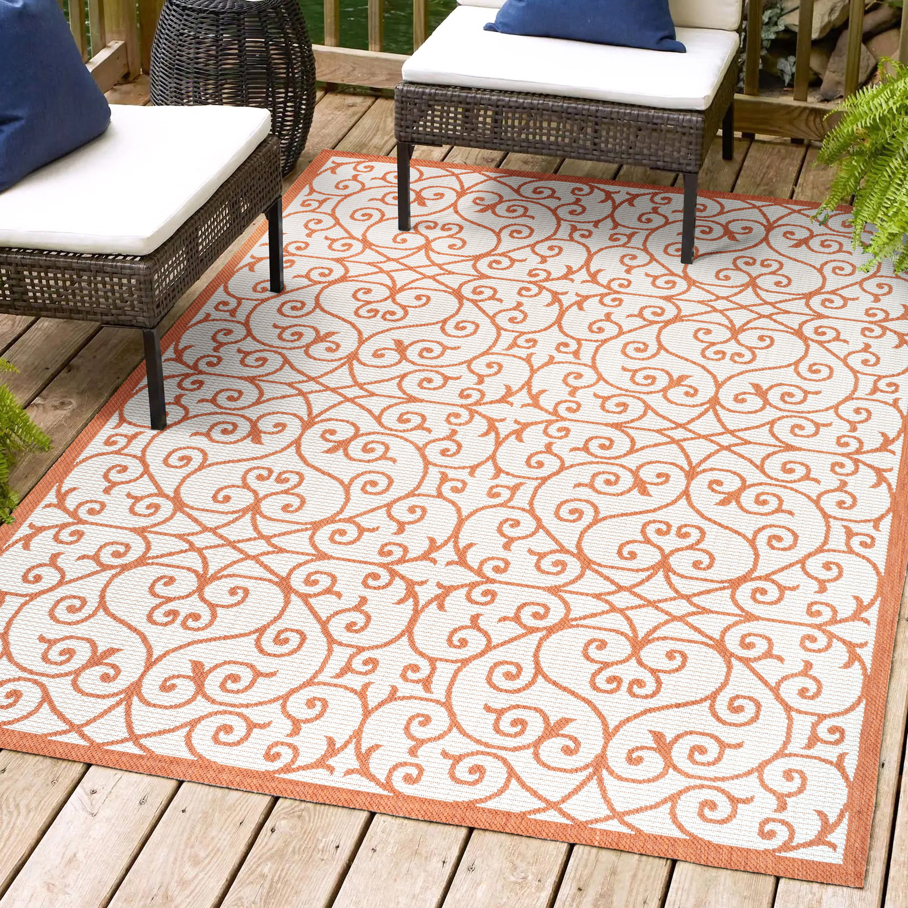 Cream and Orange 8' x 10' Synthetic Flat Woven Reversible Rug