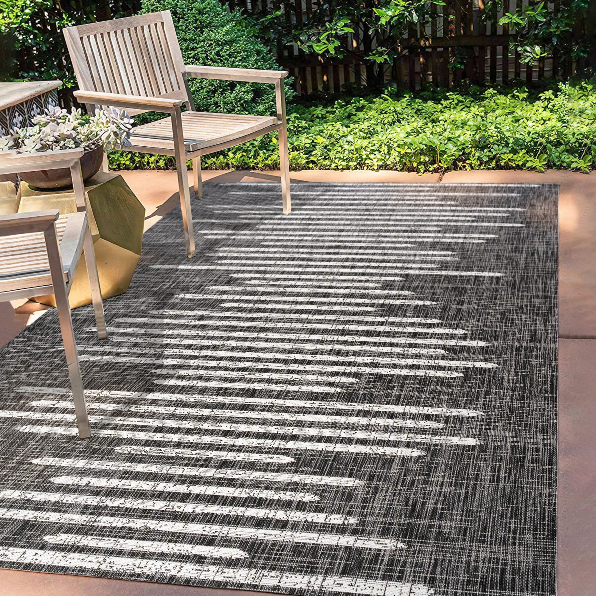 Zolak 4' x 6' Black and Ivory Synthetic Stripe Rug