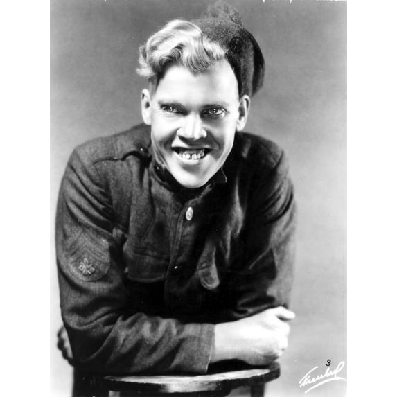 Jack Pennick Leaning on a Table in Jacket and Hat Photo Print (8 x 10)