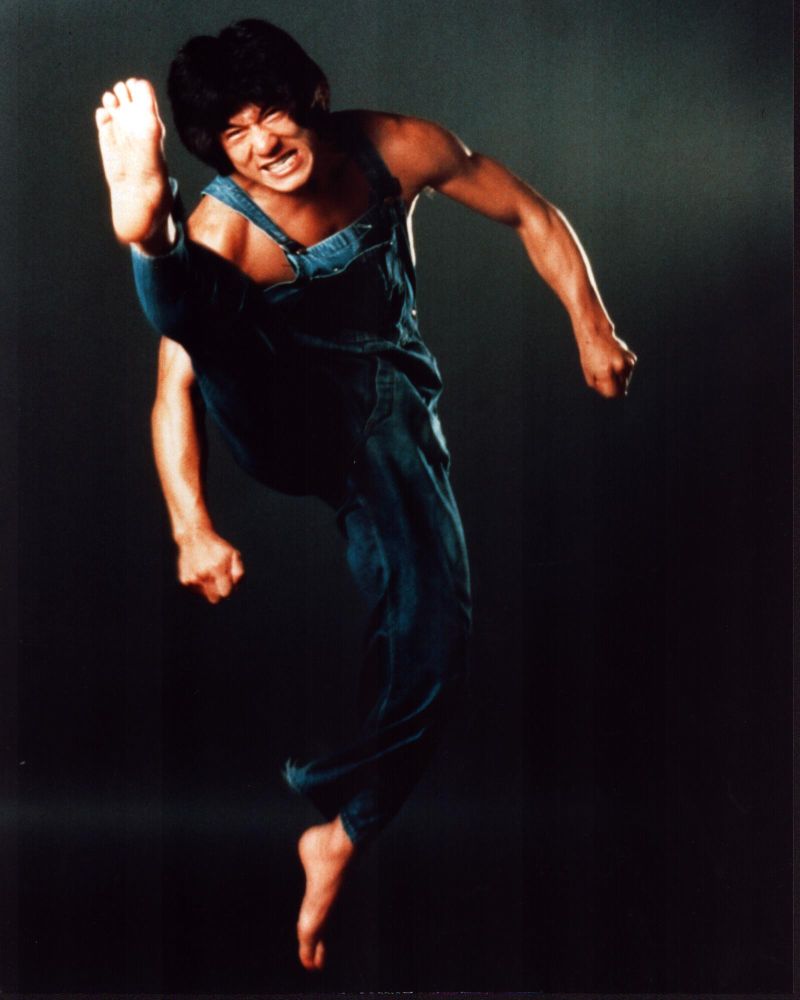 Jackie Chan Kicking In Denim Overalls Photo Print (8 x 10) Item