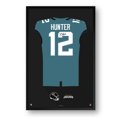 thumbnail image 1 of Travis Hunter Jacksonville Jaguars Facsimile Signature Framed Jersey Art Print, 1 of 2