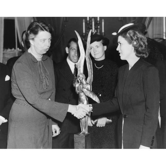 Jacqueline Cochran Receives Aviation Award. Mrs. Franklin Roosevelt Presented To Jacqueline Cochran (Right) The Trophy Of The International League Of Aviators And Aviatrix For 1937. April 4 History
