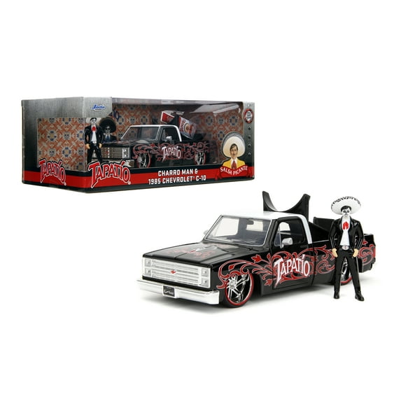 1985 Chevrolet C-10 Pickup Truck Black with White Top and Graphics with Charro Man Diecast Figure "Tapatio" 1/24 Diecast Model Car by Jada