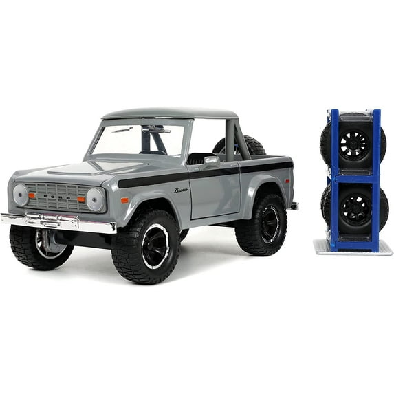 1973 Ford Bronco Pickup Truck Gray with Black Stripes with Extra Wheels "Just Trucks" Series 1/24 Diecast Model Car by Jada