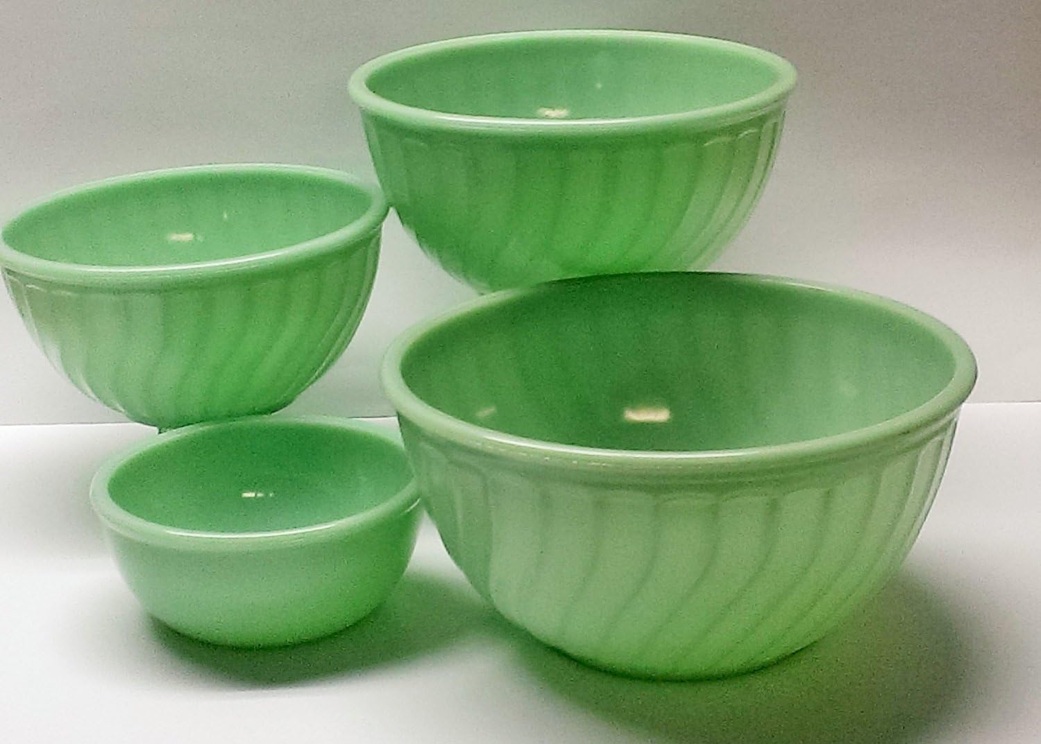 https://i5.walmartimages.com/seo/Jade-Green-Milk-Glass-Set-Of-4-Fire-King-Jadeite-Mixing-Bowls_c088a822-4aea-4506-9f4e-fd168deae4bc.1774f0ad848c4e344955cb8085235bbb.jpeg