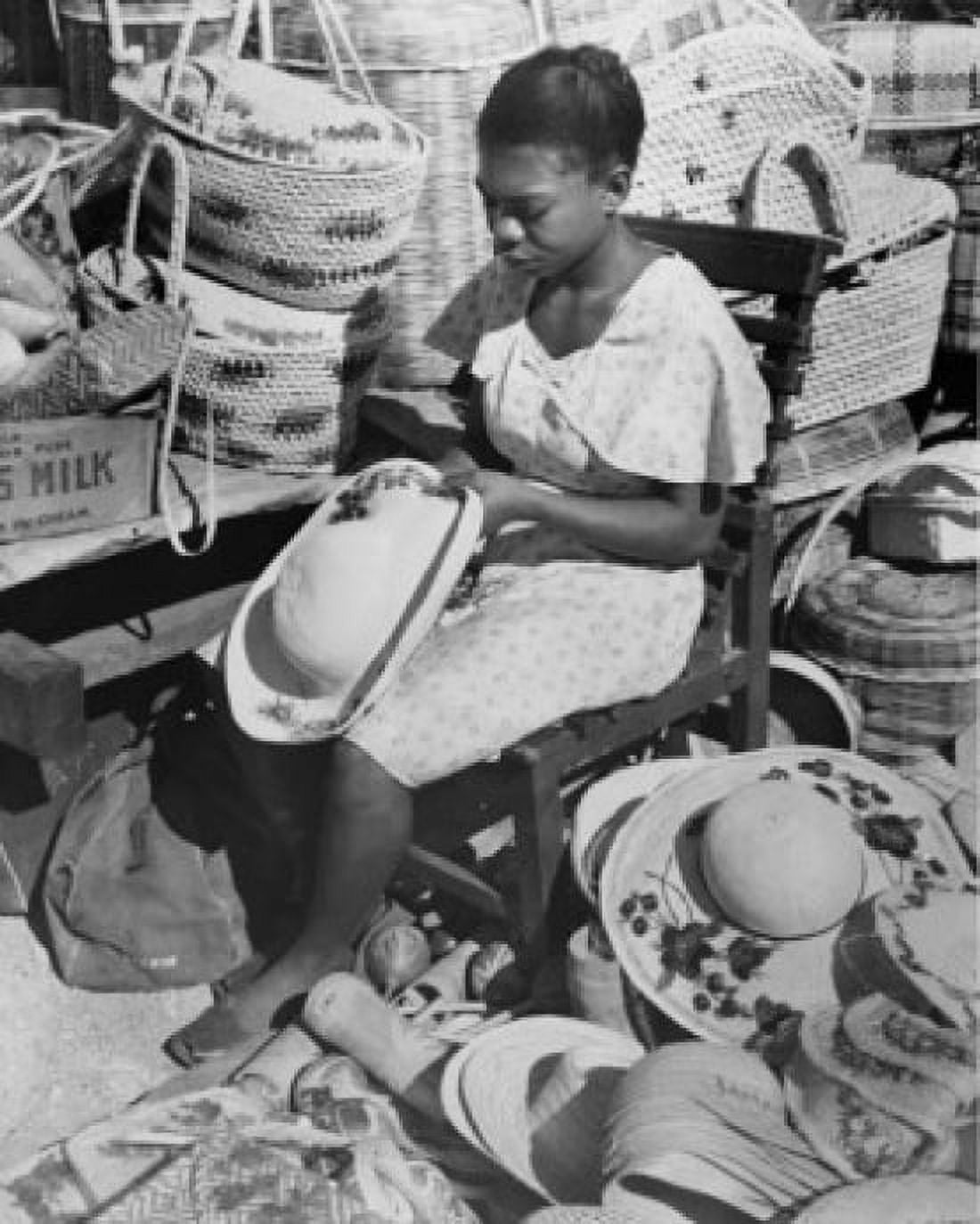 Jamaica Kingston woman decorating straw hat Canvas Art - (24 x 36)