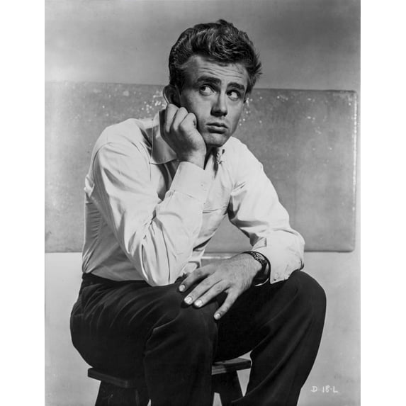 James Dean Seated on a Chair in White Long Sleeve Collar Shirt and Black Linen Pants with Knees Bent and Head Leaning on the Hand Photo Print (8 x 10)