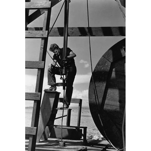 James Dean in Giant as Jet Ring working on oil rig platform 24x36 Poster