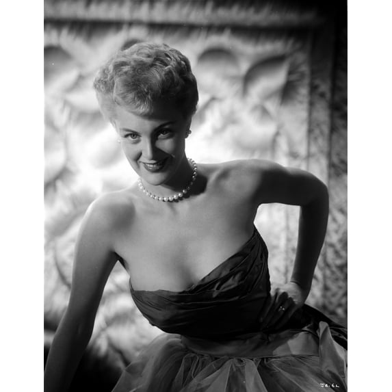 Jan Sterling Portrait in Black Velvet Strapless Dress and White Sheer Silk Skirt with Left Hand on the Waist Photo Print (24 x 30)