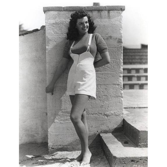 Jane Russell Posed in Silk Short Sleeve Round Neck Shirt and White Jumper Skirt with Left Hand Behind the Back Photo Print (8 x 10)