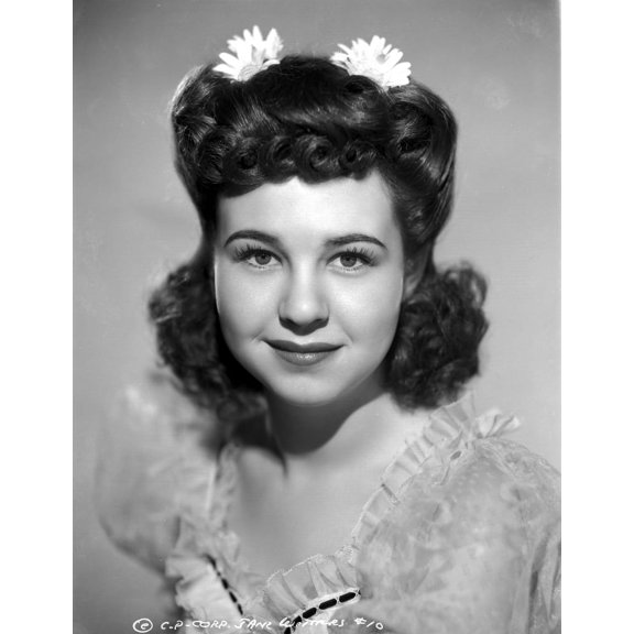 Jane Withers Portrait in Silk Ruffle Lace Neckline Short Sleeve Dress and Flower Headband Photo Print (8 x 10)