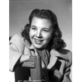 thumbnail image 1 of Jane Withers Seated on the Chair in Grey Linen Tweed Coat and Black Linen Underclothes with Right Elbow on the Top Rail Photo Print (24 x 30), 1 of 1