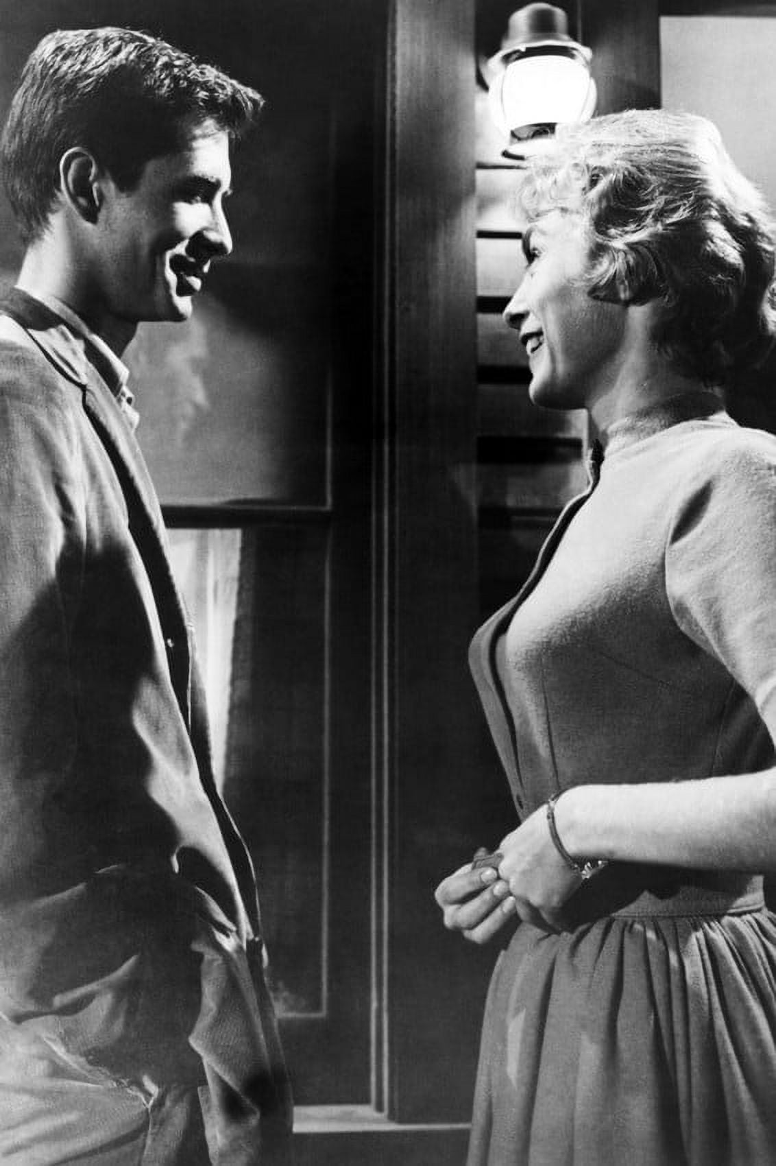 Leigh huge cleavage smiling at Anthony Perkins in Psycho in Bates