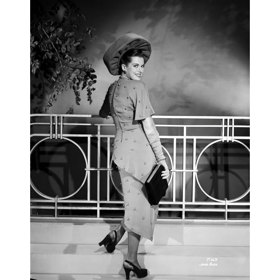 Janis Paige on a Dress standing and smiling Photo Print (8 x 10)