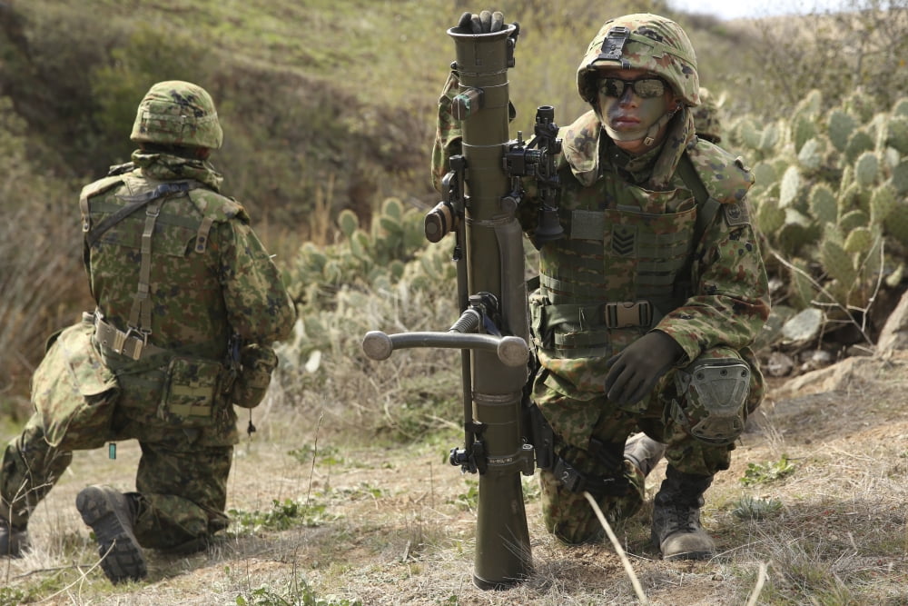 Japan Ground Self-Defense Force soldiers participate in simulated combat Canvas Art - Stocktrek Images (34 x 23)