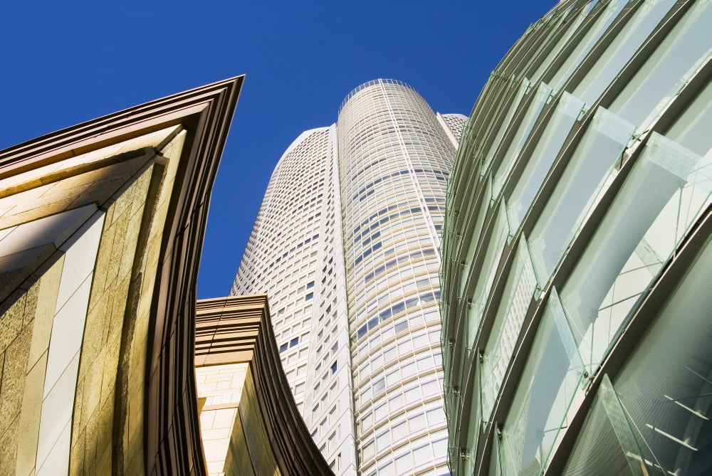 Japan Roppongi Hills Tokyo Upward View Of Mori Tower Framed By Glass And Stone Of Lower Structures Canvas Art - Bill Brennan Design Pics (34 x 22)