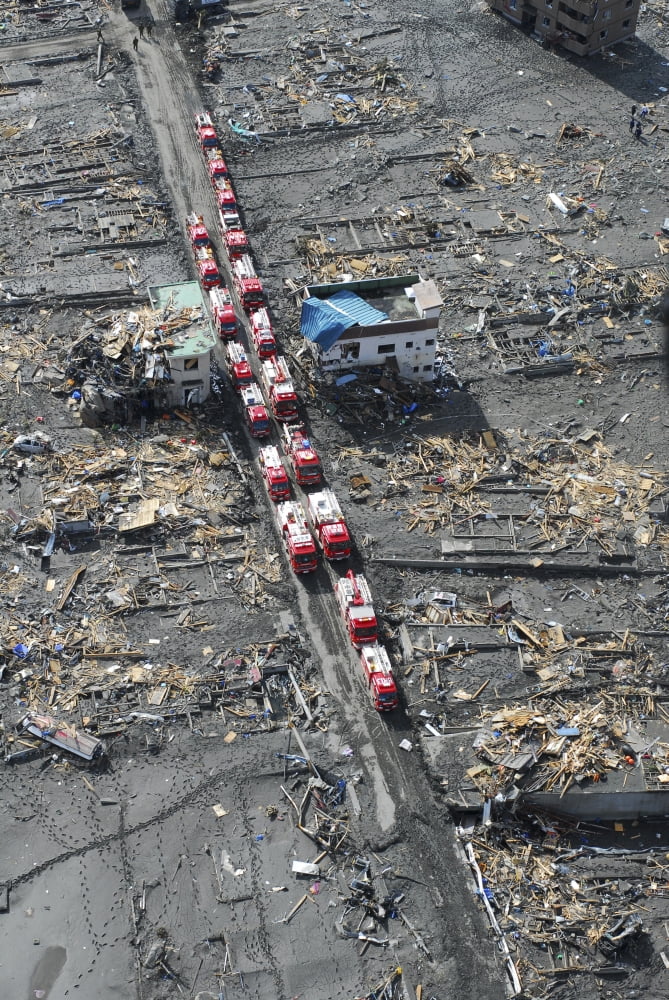 Japanese fire trucks line a road in this aerial view of Sukuiso Japan Canvas Art - Stocktrek Images (23 x 34)