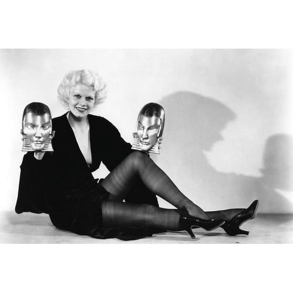 Jean Harlow in Platinum Blonde in stockings holding face busts 24x36 Poster
