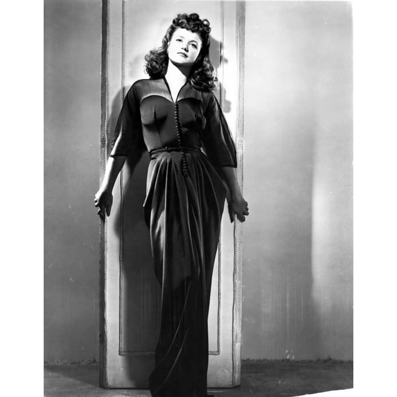 Jean Simmons Posed in Black Sheer Long Sleeve V-Neck Gathered Silk Dress with Left Hand on the Shoulder Photo Print (8 x 10)