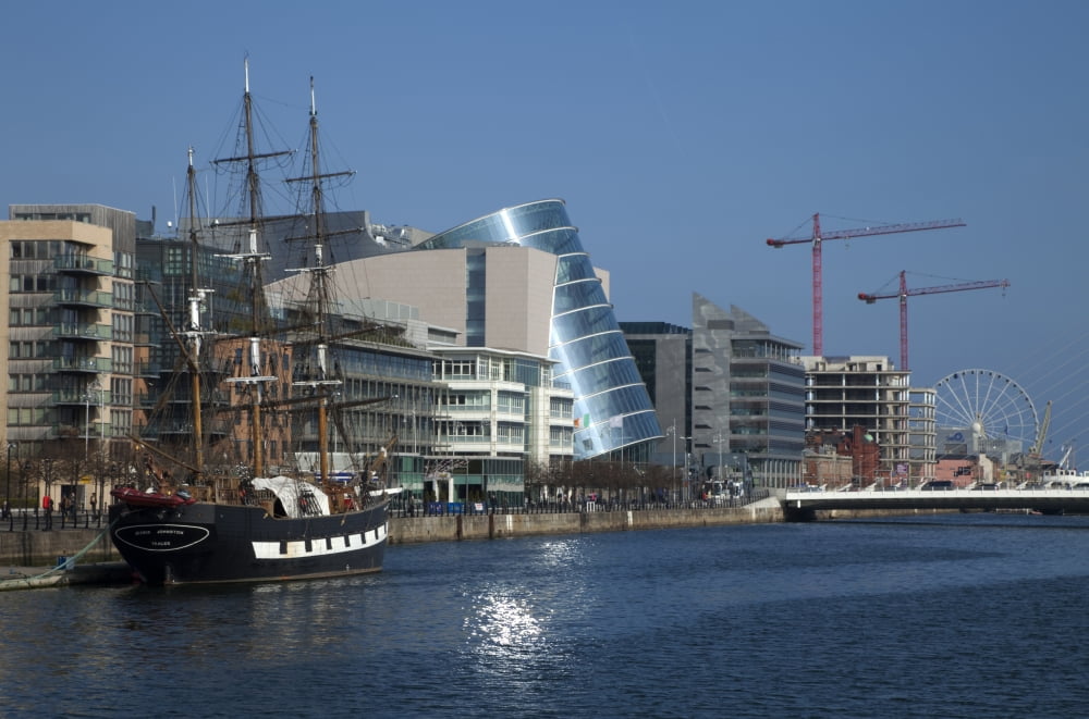 Jeanie Johnston Reconstructed Famine Ship and Museum on the River Liffey Dublin Convention Centre in background Dublin City Ireland Canvas Art - Panoramic Images (9 x 27)