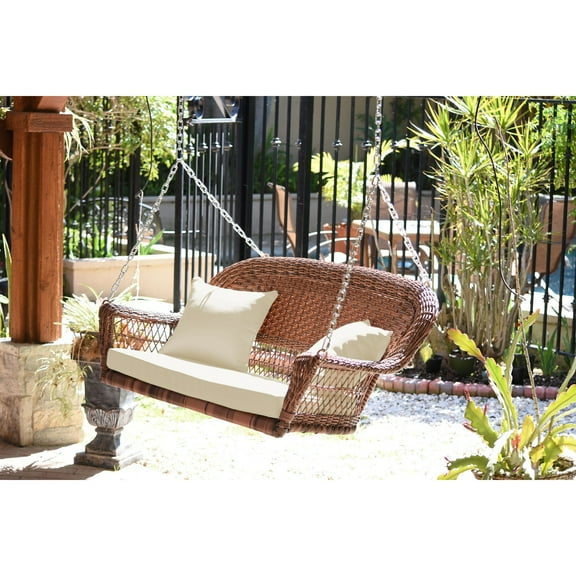 Jeco Honey Resin Wicker Porch Swing with Ivory Cushion