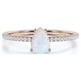 thumbnail image 1 of JeenMata 0.75 ct Pear Shaped Blue Opal and Moissanite Dainty Promise Ring in 18K Rose Gold over Silver, 1 of 7