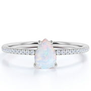 JeenMata 0.75 ct Pear Shaped Blue Opal and Moissanite Dainty Promise Ring in 18K White Gold over Silver