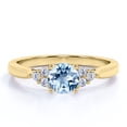 thumbnail image 1 of JeenMata 1.10 carat Round Sky Blue Created Aquamarine 7 Stone Art Deco Engagement Ring in 18k Yellow Gold over Silver, 1 of 3