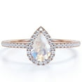 thumbnail image 1 of JeenMata 1.25 Carat Teardrop Rainbow Moonstone and Moissanite Halo Engagement Ring in 18k Rose Gold over Silver, 1 of 6