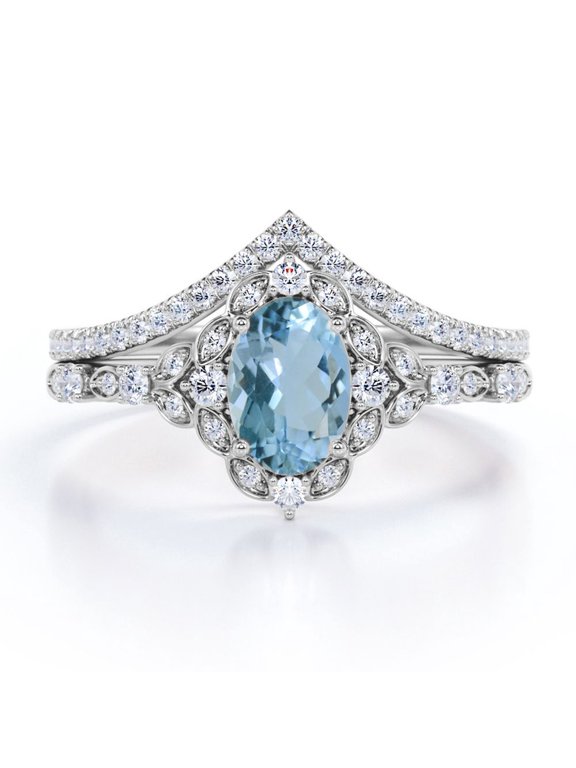 1.35 Carat Chevron Egg Shaped Sky Blue Created Aquamarine And Moissanite Pave Cluster Wedding Ring Set In 18K White Gold Plating Over Silver