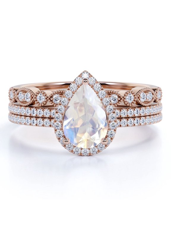 1.5 carat Pear Shaped Blue Moonstone and Moissanite Vintage Trio Wedding Ring Set in 18k Rose Gold over Silver