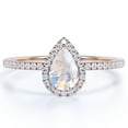 thumbnail image 1 of JeenMata 1.25 Carat Pear Shaped Rainbow Moonstone and Moissanite Halo Wedding Ring in 18k Rose Gold over Silver, 1 of 6