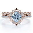 thumbnail image 1 of JeenMata 1 Carat Milgrain Cushion Shape Brazilian Created Aquamarine and Moissanite Filigree Mini-Pave Bridal Ring Set In 18K Rose Gold Plating Over Silver, 1 of 6
