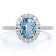 thumbnail image 1 of JeenMata 1 Carat Oval Cut Created Aquamarine and Moissanite Halo Engagement Ring in 18k White Gold over Silver, 1 of 6