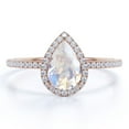 thumbnail image 1 of JeenMata 1 Carat Pear Shaped Blue Moonstone and Moissanite Halo Engagement Ring in 18k Rose Gold over Silver, 1 of 6