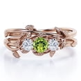 thumbnail image 1 of JeenMata 1 TCW Round Shaped Lab Created Peridot and Moissanite - Inspired by Nature - Trilogy Bridal Ring Set - 18K Rose Gold Plating over Silver, 1 of 6