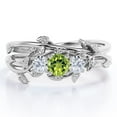 thumbnail image 1 of JeenMata 1 TCW Round Shaped Lab Created Peridot and Moissanite - Inspired by Nature - Trilogy Bridal Ring Set - 18K White Gold Plating over Silver, 1 of 6